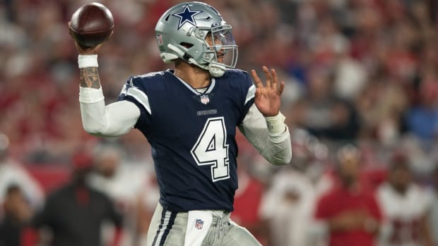 Sep 9, 2021; Tampa, Florida, USA; Dallas Cowboys quarterback Dak Prescott (4) throws the ball against the Tampa Bay Buccaneers during the first half at Raymond James Stadium.